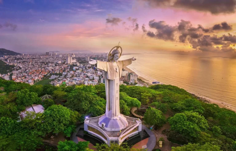 Christ the King statue overlooking Vung Tau city and coastline in Vietnam travel destination