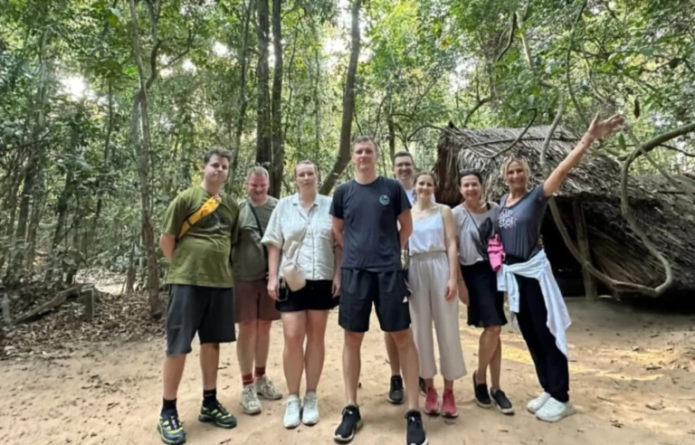 International tourists visiting the Cu Chi Tunnels forest area in Ho Chi Minh City, Vietnam travel