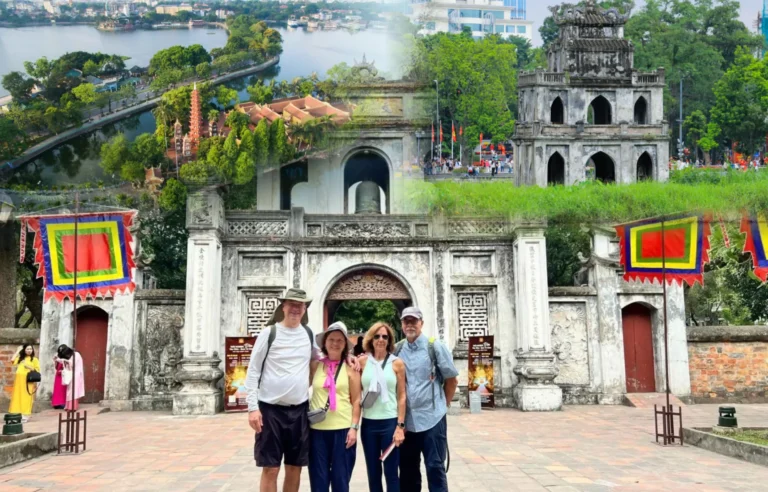 Hanoi City Full Day Group Tour featuring Hoan Kiem Lake, Ngoc Son Temple, and the Turtle Tower with international travelers exploring Hanoi’s historic landmarks.