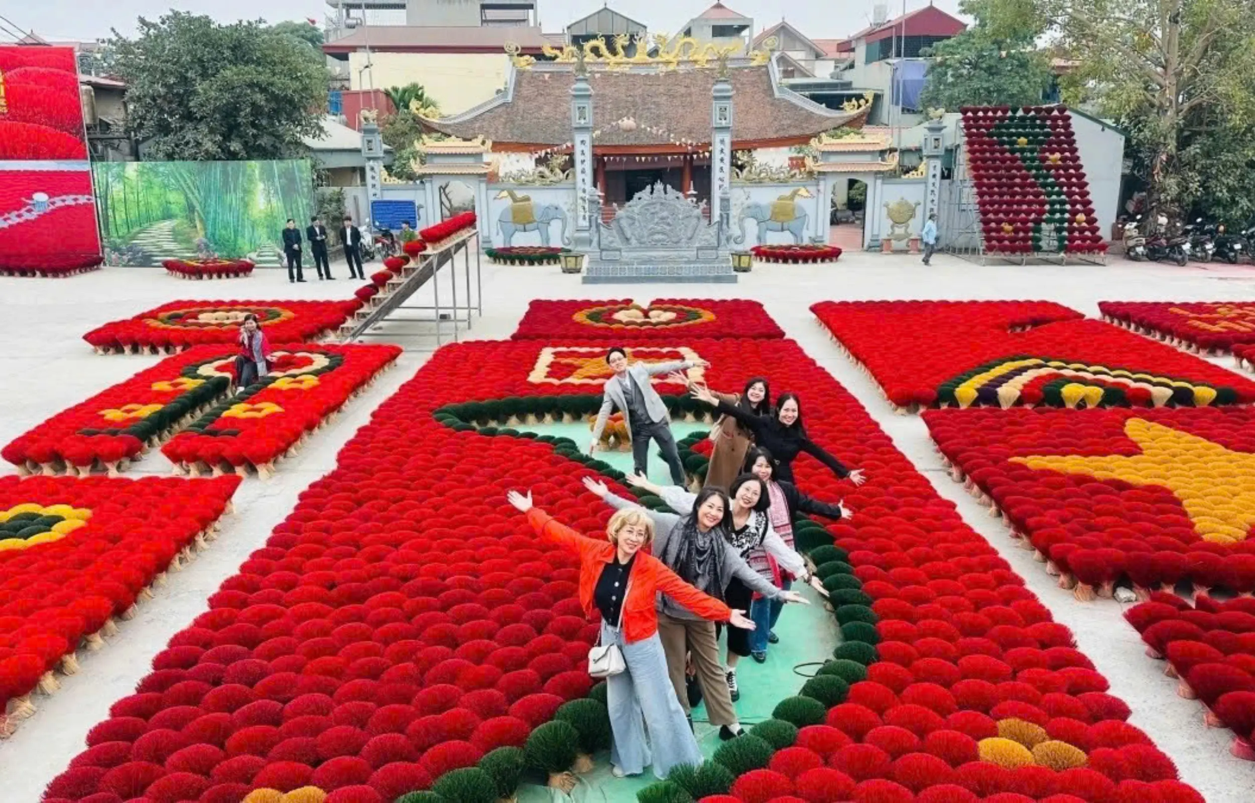 Hanoi Real Life One Day Tour with travelers experiencing local culture, traditional festivals, temples, and daily life in Hanoi city, Vietnam travel experience.