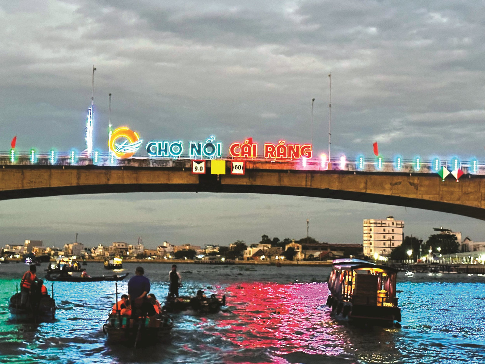 Cai Rang Floating Market in Can Tho with boats trading fruits and local goods on the river in the Mekong Delta