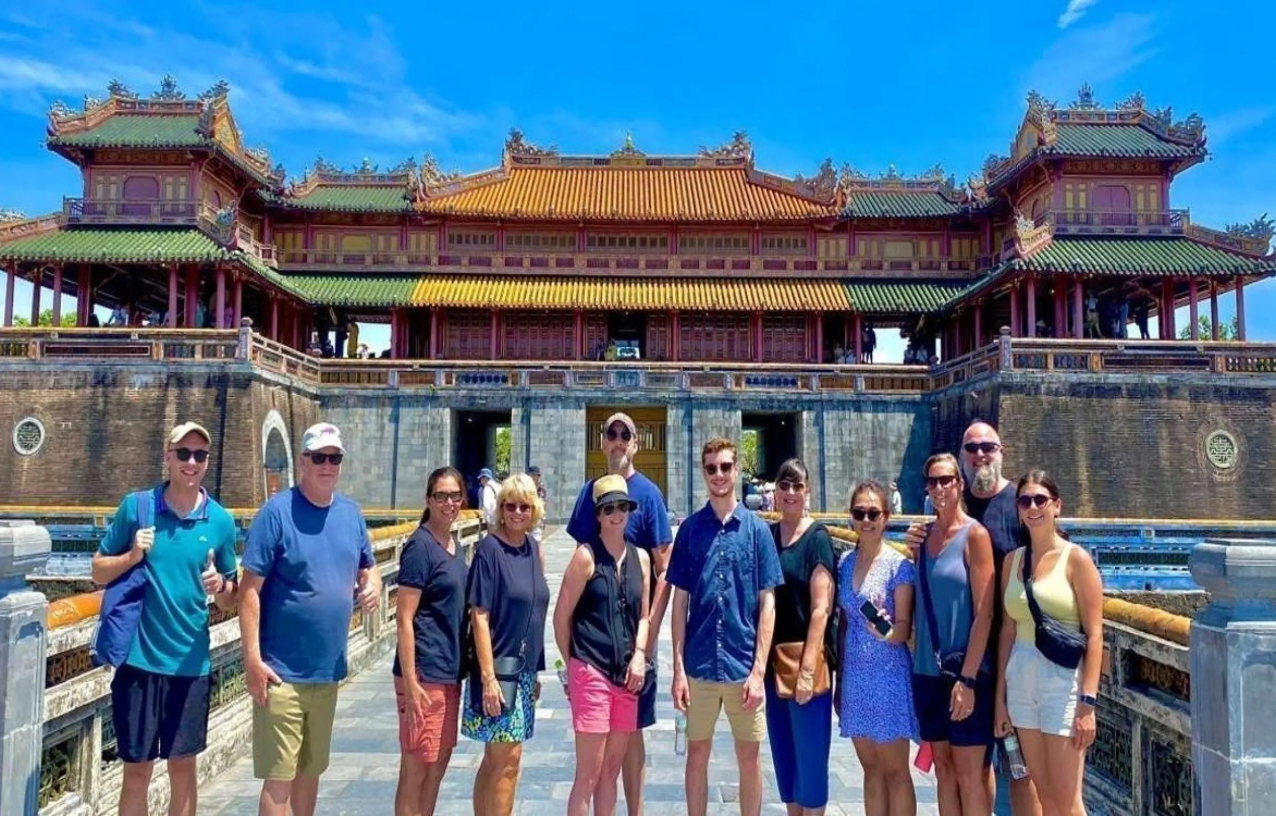 International travelers visiting Hue Imperial City on a full day tour Vietnam travel
