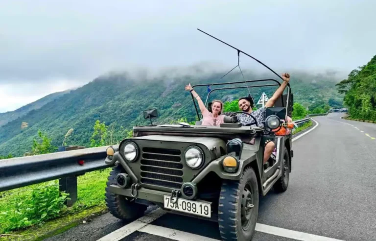 Jeep tour from Hoi An to Hue via Hai Van Pass with mountain and ocean views Vietnam travel