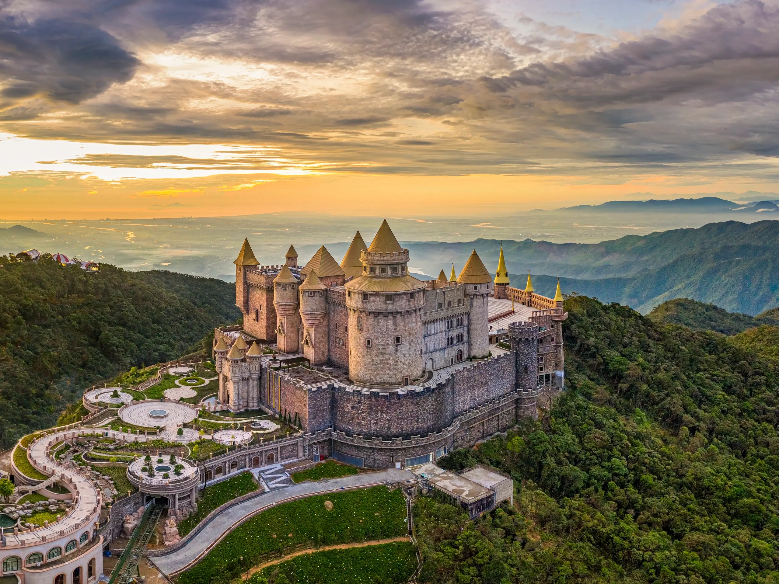 Ba Na Hills in Da Nang featuring mountain scenery, French village architecture, and the Golden Bridge