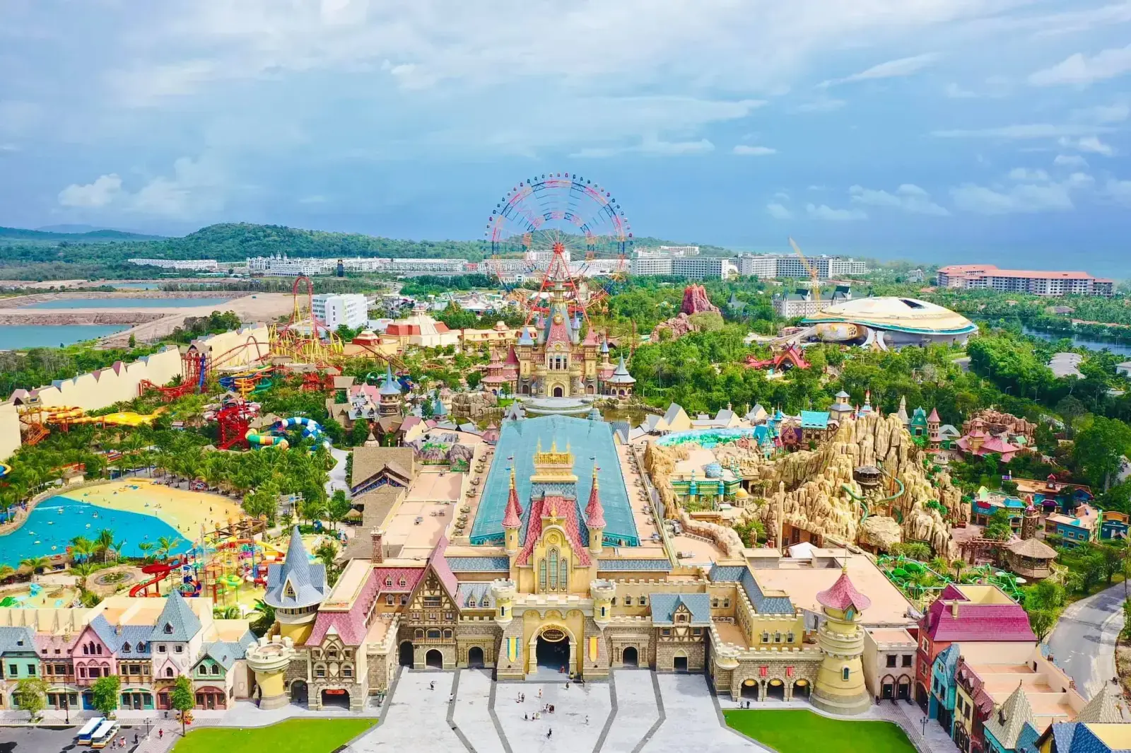 VinWonders Phu Quoc theme park with colorful castle, amusement rides, and visitors enjoying attractions, top entertainment destination in Vietnam