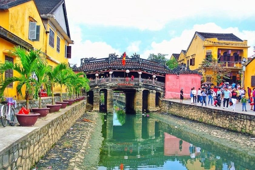 Japanese Covered Bridge crossing a canal in Hoi An Ancient Town, Vietnam.