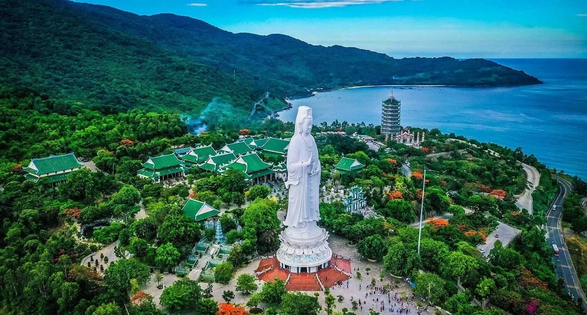 Aerial view of the Lady Buddha statue at Linh Ung Pagoda overlooking the sea in Da Nang.