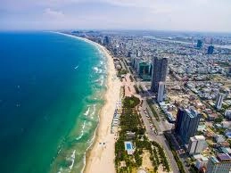 Aerial view of My Khe Beach with golden sand and turquoise water in Da Nang.