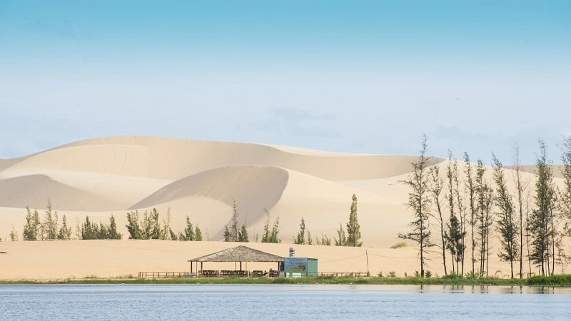 White sand dunes stretching across the landscape in Mui Ne, Vietnam.