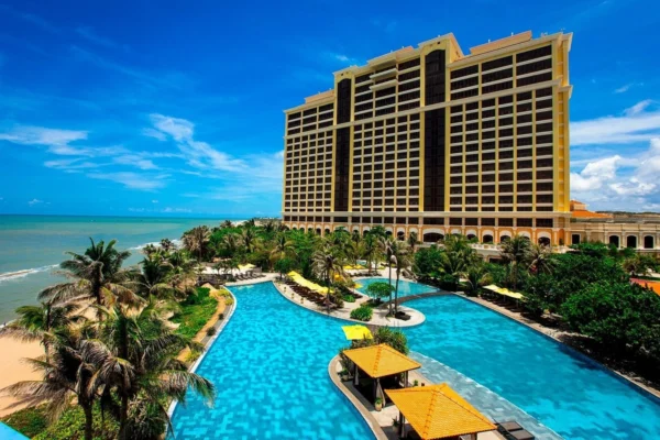 Luxury beach resort with large swimming pool at Ho Tram coastline Vietnam