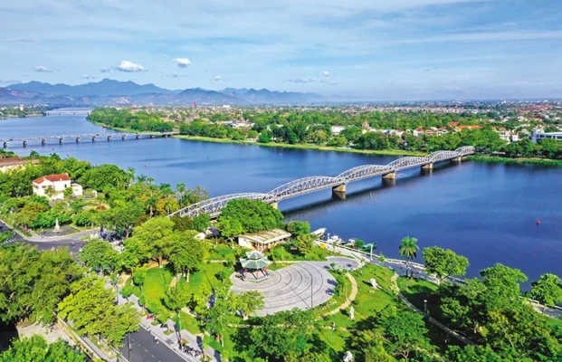Truong Tien Bridge spanning the Huong River in Hue Vietnam with a panoramic city view