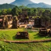 Panoramic view of My Son Sanctuary in Quang Nam featuring ancient Cham temple ruins, green forest, and mountain scenery with StarTour