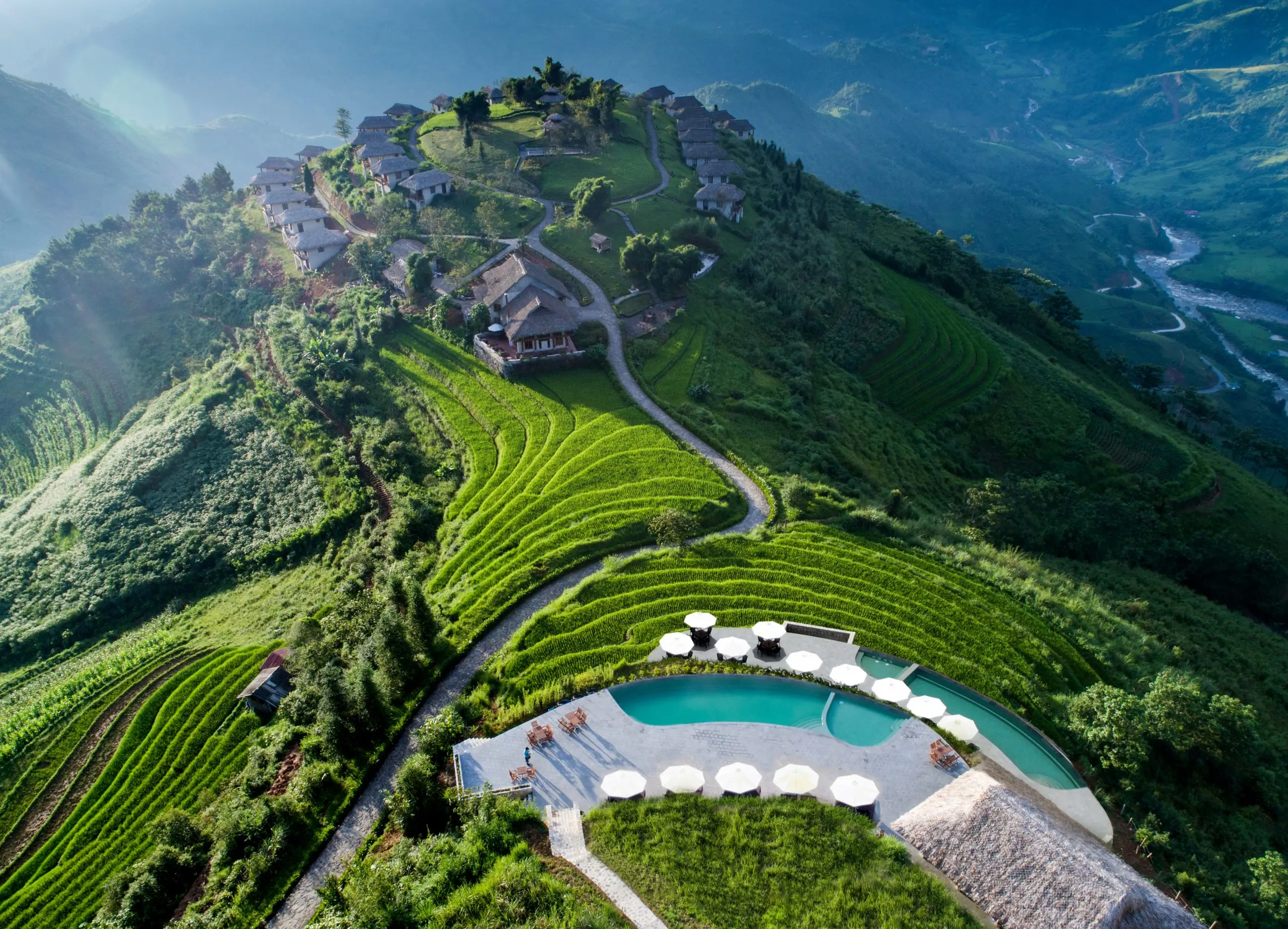 Topas Ecolodge luxury mountain resort with infinity pool and rice terraces in Northern Vietnam by StarTour
