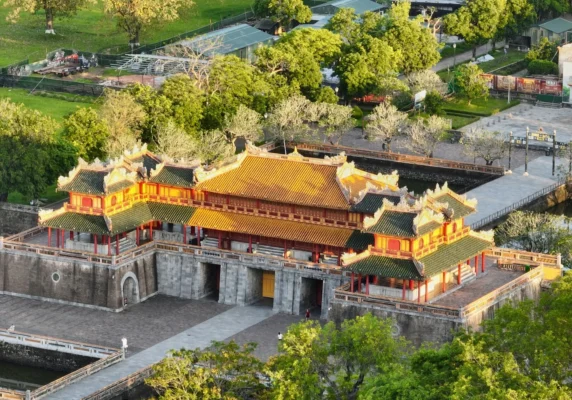 Aerial top-down view of the golden Ngo Mon Gate bathed in sunlight at Hue Imperial Citadel on a tour with startour.