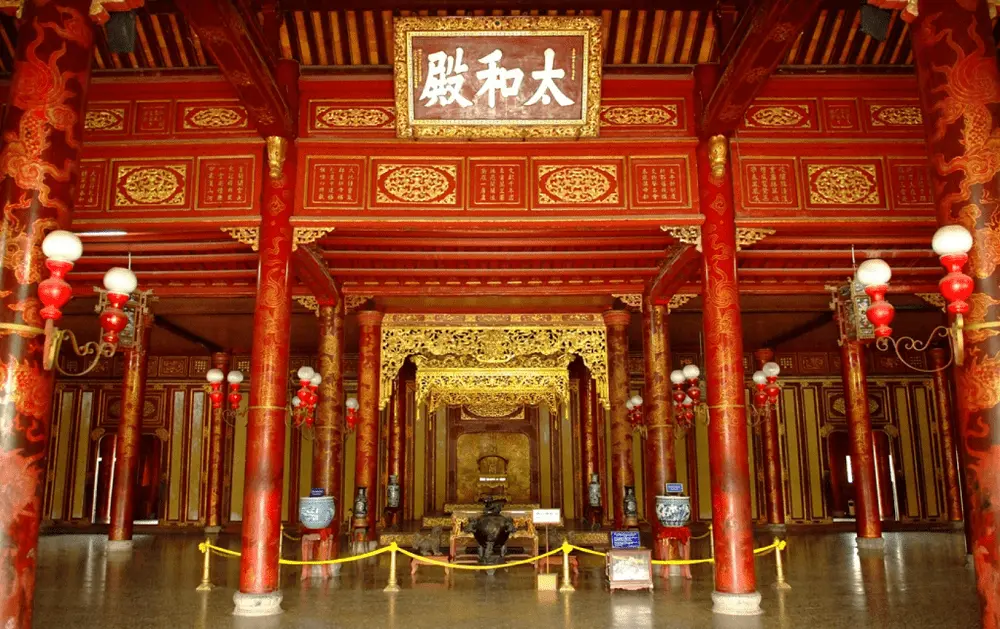 Interior of Thai Hoa Palace featuring the Nguyen Dynasty throne inside Hue Imperial Citadel on a guided tour with startour.